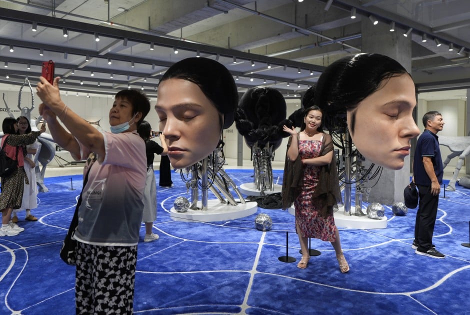 Giant sculptures of resting human, bison and robots unveiled at