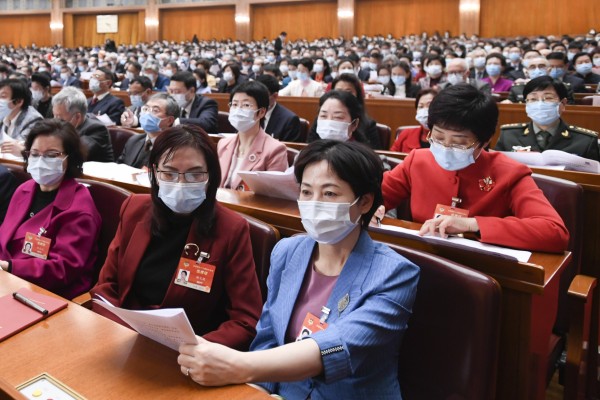Women attend a meeting of the 13th CPPCC National Committee at the Great Hall of the People in Beijing on March 4. Photo: Xinhua