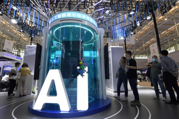 People view exhibits at the World Intelligence Congress, an AI event, in Tianjin, China, on May 20. Photo: Xinhua
