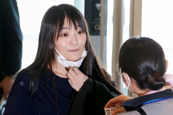 Former princess Mako Komuro, the eldest daughter of Crown Prince Akishino and Crown Princess Kiko, pictured in November en route to her new life in the US. Photo: Reuters Former princess Mako Komuro, the eldest daughter of Crown Prince Akishino and Crown Princess Kiko, pictured in November en route to her new life in the US. Photo: Reuters