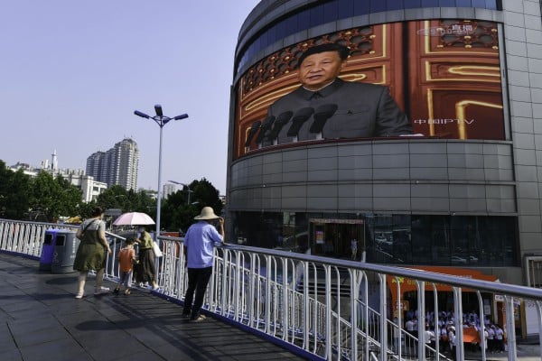 A giant screen in the Anhui provincial city of Fuyang broadcasting a speech by the Chinese President Xi Jinping on July 1, 2021 during the centenary celebrations of the ruling Communist Part of China (CPC). Photo: SOPA Images/LightRocket via Getty Images A giant screen in the Anhui provincial city of Fuyang broadcasting a speech by the Chinese President Xi Jinping on July 1, 2021 during the centenary celebrations of the ruling Communist Part of China (CPC). Photo: SOPA Images/LightRocket via Getty Images