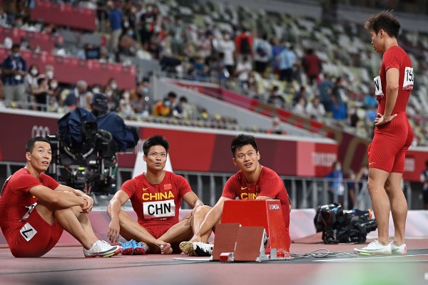 Members of China’s 4x100m relay final look disappointed after crossing the line fourth at the Tokyo 2020 Olympic Games in 2021. Photo: Xinhua