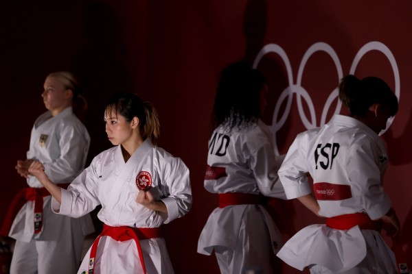 Hong Kong’s Grace Lau Mo-sheung (centre) practices before her event in the karate women’s kata elimination round at the Tokyo Olympic Games at the Nippon Budokan, Japan. Photo: Getty Images   