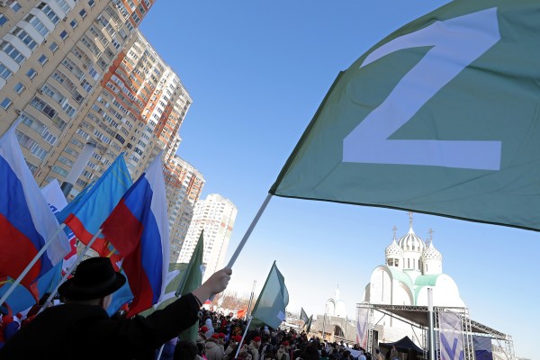 An activist waves a flag with the letter ‘Z’ during a rally in support of Russian Armed Forces in Moscow. Photo: EPA-EFE