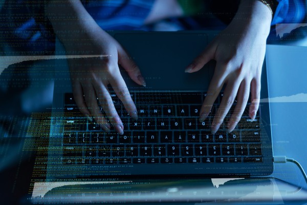 File photo of woman on a keyboard. Photo: Getty Images