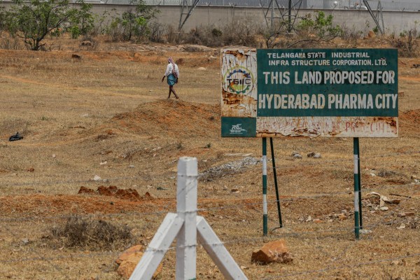A sign board displayed at the site for Pharma City in Hyderabad, India, on Tuesday, March 22, 2022. On the edge of Hyderabad in southern India, a vast patch of arid shrub-land the size of about 14,000 football fields is becoming a testing ground for a model that could help wean the world off its dependence on Chinese drug ingredients. Photo: Bloomberg