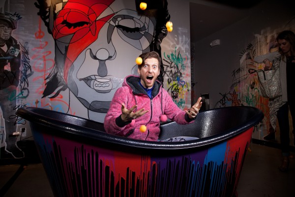 SAN FRANCISCO, CA - MAY 19:  Ping-pong professional Adam Bobrow poses for photos in the photobooth tub at the SPiN San Francisco Grand Opening on May 19, 2016 in San Francisco, California.  (Photo by Kelly Sullivan/WireImage)