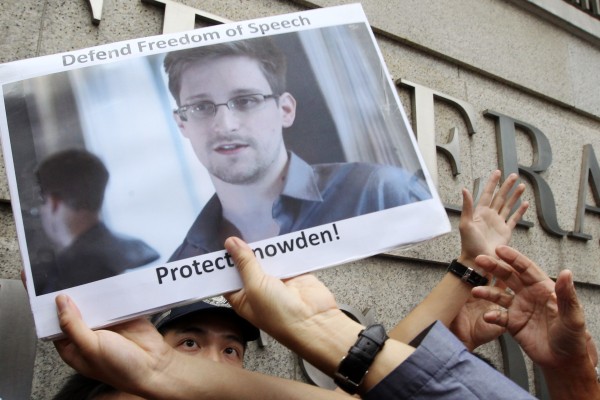 Members of the League of Social Democrats gather at the US consulate in Hong Kong in June to support whistle-blower Edward Snowden, who later left for Russia. Photo: Edward Wong
