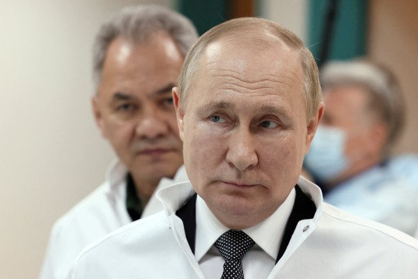 Russian President Vladimir Putin and Defence Minister Sergei Shoigu. Photo: Reuters