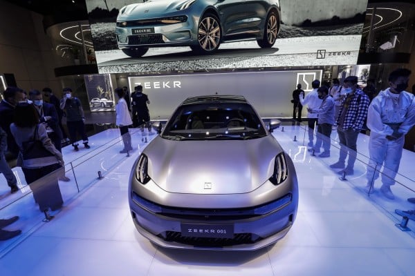 Zhejiang Geely Holding Group’s Zeekr 001 electric vehicle at the Auto Shanghai car show on April 19, 2021. Electric cars have become the new battleground for tech giants and carmakers to offer services through new platforms and ecosystems, leading Geely to acquire flagging smartphone brand Meizu. Photo: Bloomberg Zhejiang Geely Holding Group’s Zeekr 001 electric vehicle at the Auto Shanghai car show on April 19, 2021. Electric cars have become the new battleground for tech giants and carmakers to offer services through new platforms and ecosystems, leading Geely to acquire flagging smartphone brand Meizu. Photo: Bloomberg