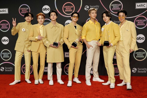 (L-R) V, Suga, Jin, Jungkook, RM, Jimin, and J-Hope of BTS are seen at the 2021 American Music Awards in LA. File photo: Getty Images North America via AFP