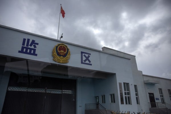 A Chinese flag flies over a vehicle entrance to the inmate detention area at the Urumqi No. 3 Detention Centre in Xinjiang in April 2021.  Photo: AP