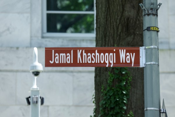 The renaming is ceremonial, as signified by the brown street sign instead of the usual green. Photo: Reuters