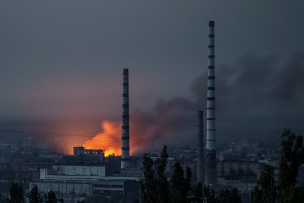 Smoke and flame rise after a Russian strike on a compound of Sievierodonetsk’s Azot chemical plant on Saturday. Photo: Reuters
