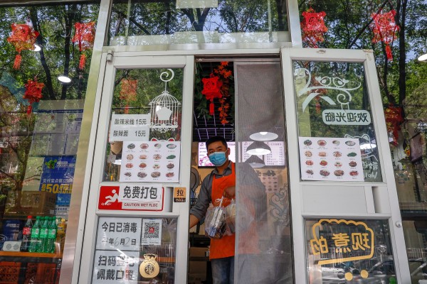 China’s State Council unveilved a 33-point package of policy items to help ‘get the economy back on a normal track’ towards the end of May. Photo: EPA-EFE