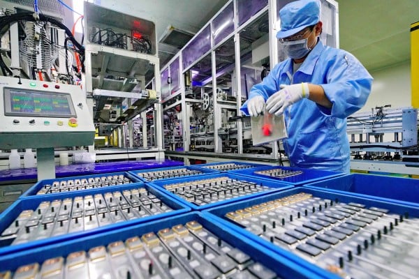 A worker on a production line at a lithium battery plant for automotive use in the Hebei provincial city of Tangshan on April 11, 2019. Photo: Xinhua. A worker on a production line at a lithium battery plant for automotive use in the Hebei provincial city of Tangshan on April 11, 2019. Photo: Xinhua.