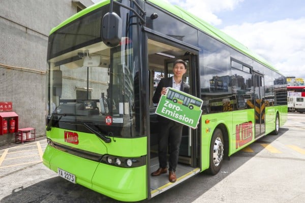 Addie Lam Tze-ho, assistant director of communications with Kowloon Motor Bus, poses on the company’s new electric single-deck bus at a depot in Kowloon Bay on June 29, 2022. Photo: SCMP / Jonathan Wong Addie Lam Tze-ho, assistant director of communications with Kowloon Motor Bus, poses on the company’s new electric single-deck bus at a depot in Kowloon Bay on June 29, 2022. Photo: SCMP / Jonathan Wong