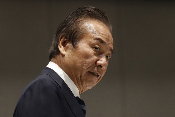 Tokyo 2020 executive Haruyuki Takahashi was arrested along with three employees of a clothing company. Photo: AP