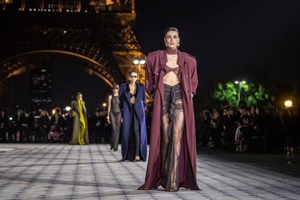 Models present creations from the spring/summer 2023 ready-to-wear collection by Saint Laurent fashion house during the Paris Fashion Week, in Paris, France, on September 27. Photo: EPA-EFE