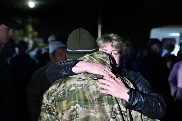 A woman bids farewell to a reservist drafted during the partial mobilisation in the Siberian settlement of Bolsherechye, Russia’s Omsk region. File photo: Reuters