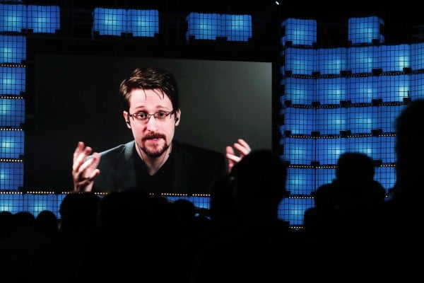 Former US National Security Agency contractor Edward Snowden speaks via video link at a conference in Lisbon in November 2019. Photo: AP Former US National Security Agency contractor Edward Snowden speaks via video link at a conference in Lisbon in November 2019. Photo: AP