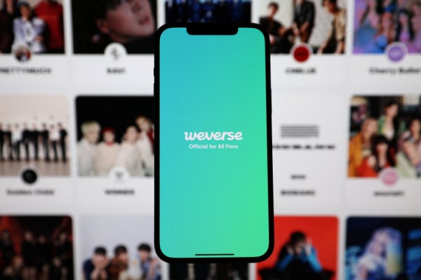 The Weverse app is where fans of groups such as BTS interact with their idols, consume music and videos and buy merch. Image: Reuters