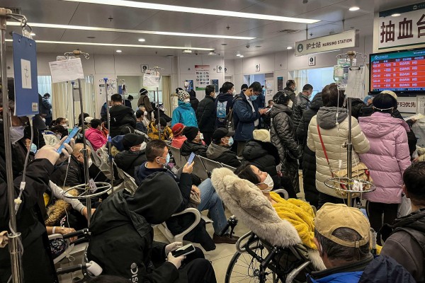 People in the emergency department of a hospital in Beijing on Tuesday. Cities across China have struggled with surging Covid infections. Photo: AFP