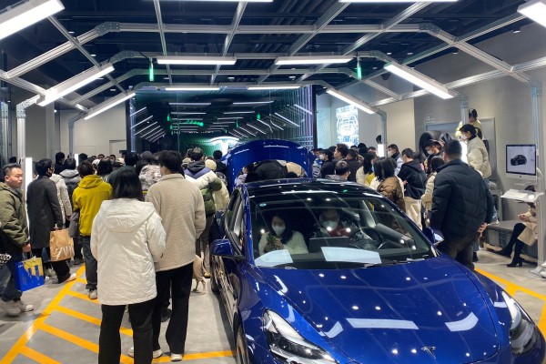 A photo obtained from social media shows people gathering to protest at a Tesla showroom in Chengdu, China on January 6, 2023. Photo: Reuters