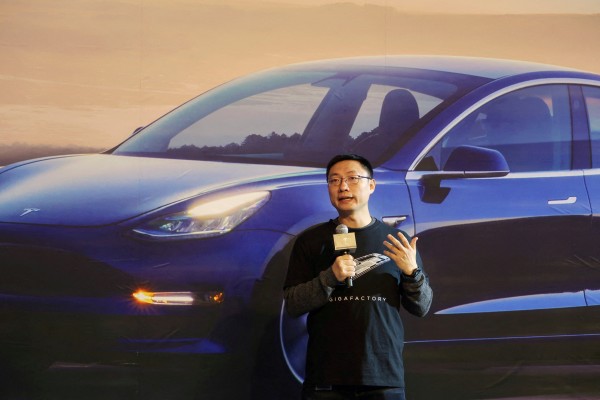 Tesla’s China chief Tom Zhu speaks at a delivery ceremony for China-made Tesla Model 3 vehicles in the Shanghai Gigafactory in December 2019. Photo: Reuters