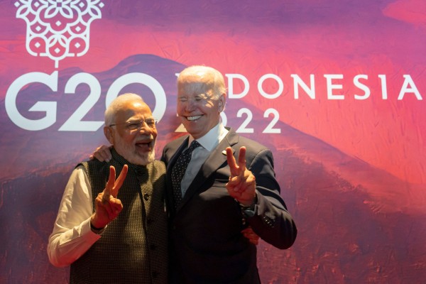 India’s Prime Minister Narendra Modi and US President Joe Biden pose for pictures before the Partnership for Global Infrastructure and Investment meeting at the G20 Summit in Nusa Dua on the Indonesian resort island of Bali on November 15. Photo: AFP