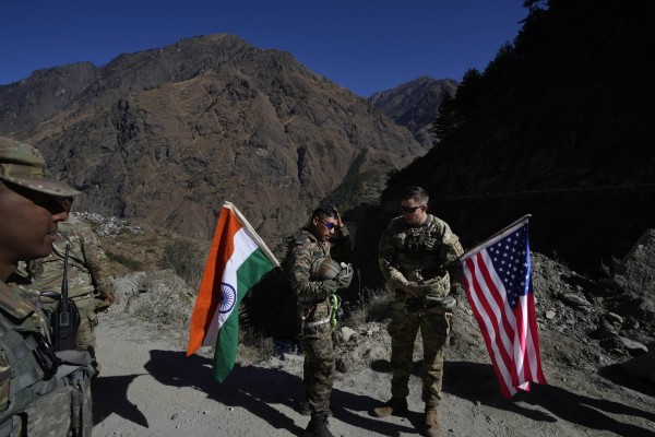 Soldiers from the Indian and US armies carry their respective flags during a break in an Indo-US joint exercise in Tapovan, in the Indian state of Uttarakhand in November 2022. Photo: AP