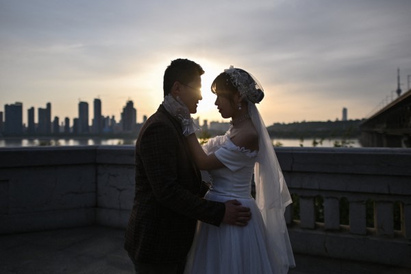 The number of people getting married for the first time dropped to 11.6 million last year, almost 700,000 down on the previous year. Photo: AFP