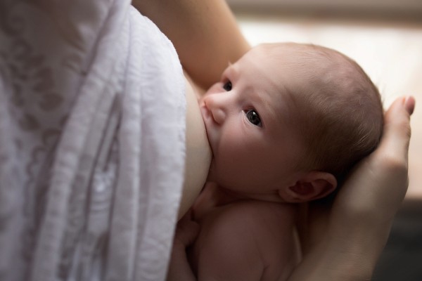 A mother breastfeeding her newborn child. Human milk plays a vital role in sustaining our species, but scientists know little about it. A university in the US plans to change that with a new institution studying human milk. Photo: Shutterstock