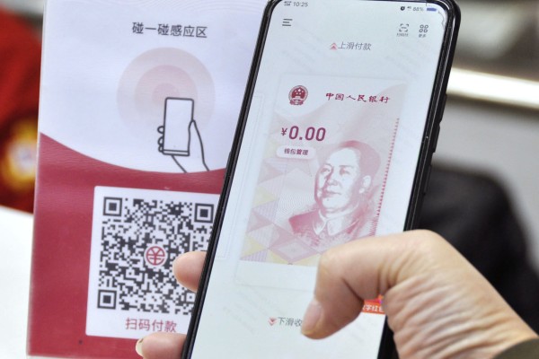 A smartphone shows the app for China’s digital yuan in Suzhou on December 14, 2020. Photo: Kyodo