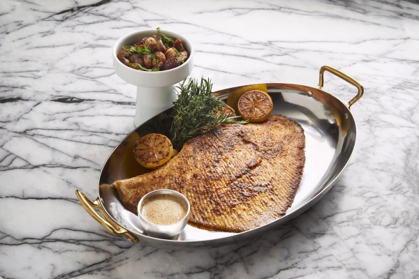 Keto themed dish skate wing cooked teppan, endives comte salade from Clarence in Soho, Hong Kong, 2023.&#xA;&#xA;Credit:  Clarence