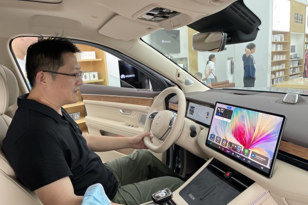 A M7 SUV developed by Aito, Huawei’s EV brand, is displayed in a shop of the telecoms equipment giant in Beijing, in this file photo from September. Aito says it received 90,000 orders for the SUV just two months after it hit the market. Photo: Simon Song 
