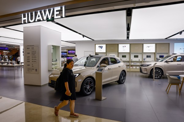 A showroom in Beijing displays vehicles from Aito, a joint brand between Huawei and Seres. Photo: EPA-EFE