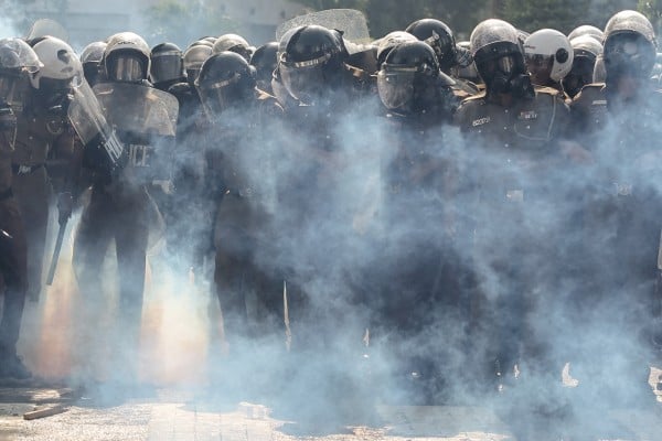 Police use tear gas and water cannon to disperse demonstrators during an anti-government protest in the Sri Lankan capital Colombo on January 30. Analysts say voters have become disillusioned with the nation’s traditional ruling elite and want change. Photo: Reuters