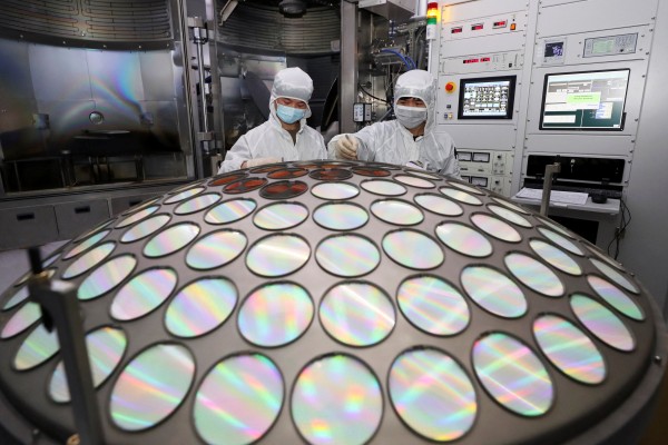 Employees work on the semiconductor chip production line at Jiangsu Azure Corp in Huaian, Jiangsu province, in March 2022. Photo: China Daily via Reuters