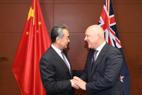 New Zealand Prime Minister Christopher Luxon greets Chinese Foreign Minister Wang Yi in Wellington. Photo: Chinese Ministry of Foreign Affairs 