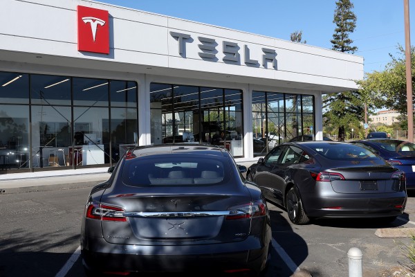 Brand new Tesla cars sit parked at a Tesla dealership in October 2023, in Corte Madera, California. Photo: Getty Images