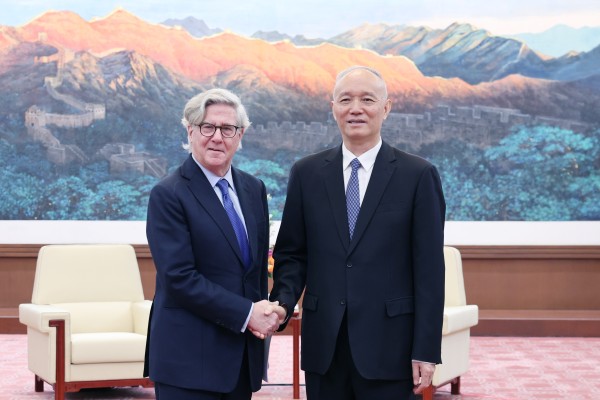 American businessman John Thornton (left) meets Cai Qi, a Politburo Standing Committee member, in Beijing on Friday. Photo: Xinhua