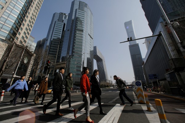Fitch said the current size of China’s banking system limits the amount of support the central government could give to its biggest lenders. Photo: Reuters