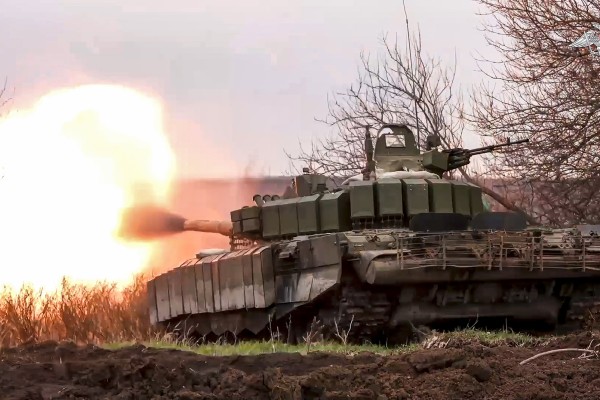 An image released in March shows a Russian tank firing at Ukrainian troops from a position in Russia’s Belgorod region. Photo: Russian Defence Ministry Press Service via AP