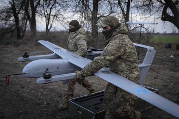 Ukrainian soldiers prepare to launch the Poseidon H10 Middle-range drone near the city of Bakhmut in Ukraine’s Donetsk region on March 26. Photo: AP