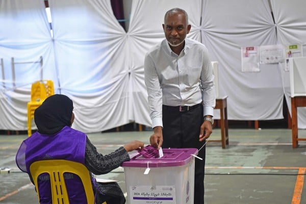 Maldives President Mohamed Muizzu casts his ballot in Male during the country’s parliamentary election on Sunday. Photo: AFP