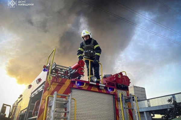 An emergency worker extinguishes a fire after a Russian attack on the Trypilska thermal power plant in Ukrainka, Kyiv, on April 11. Even if a return to negotiations is currently implausible, this will not be so indefinitely, as war without end is costly. Photo: Ukrainian Emergency Service via AP