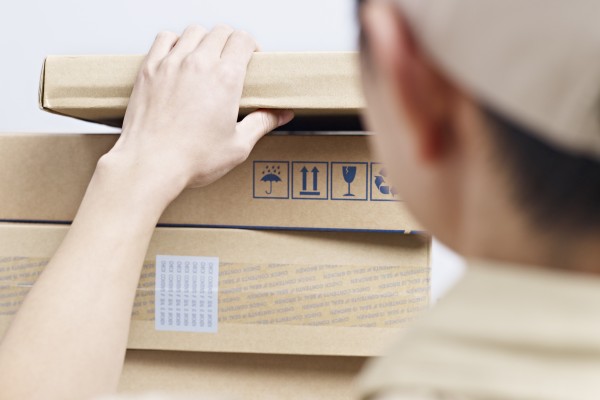 In Jiangsu province, a regulation that took effect on April 15 states that courier companies and their workers must report “clues about national security violations and crimes” they discover during their work. Photo: Shutterstock Images