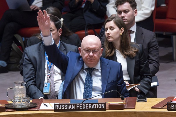 Russian Permanent Representative to the UN Vassily Nebenzia raises his hand to veto the non-proliferation of nuclear weapons resolution bill at the United Nations headquarters on Wednesday. Photo: AP