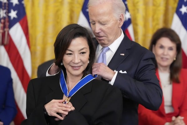 US President Joe Biden awards the nation’s highest civilian honour, the Presidential Medal of Freedom, to actress Michelle Yeoh at the White House on Friday. Photo: AP